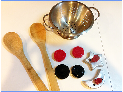 Kitchen accessories wooden spoon, strainer and cookie cutters