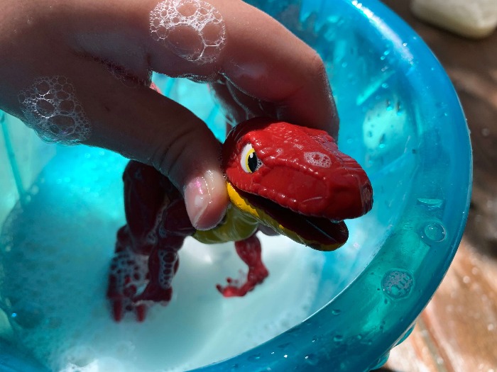 Science Bubble Experiment with Dinosaur Toy