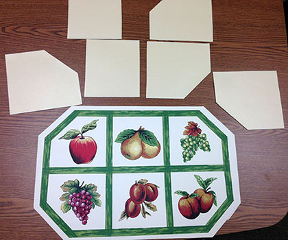 Kitchen placemats cut into pieces for puzzle placements activity