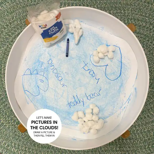 Creative tuff tray activity using chalk and textures for preschool art exploration.
