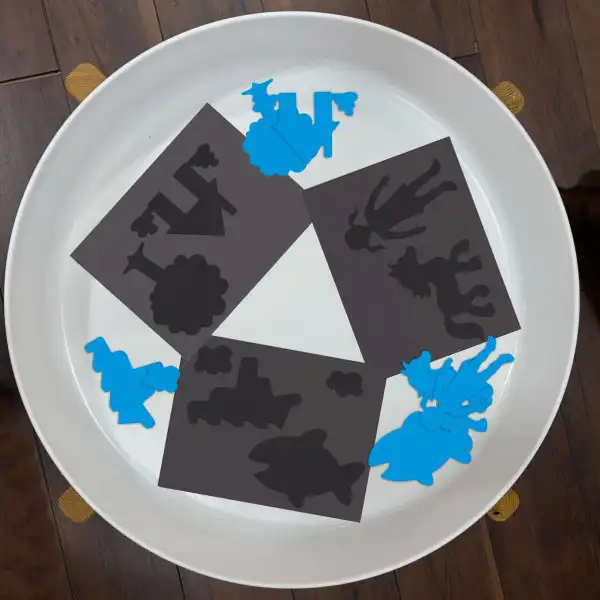 Science-inspired tuff tray activity combining sunlight and creativity.