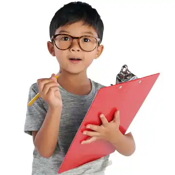 Preschool boy holding a clipboard