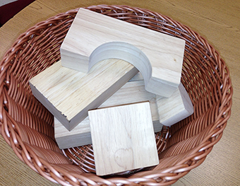 Block Puzzle Activity Various size wood Blocks in Wicker Basket