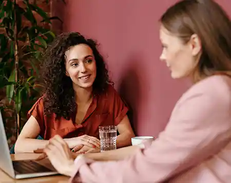 two women talking