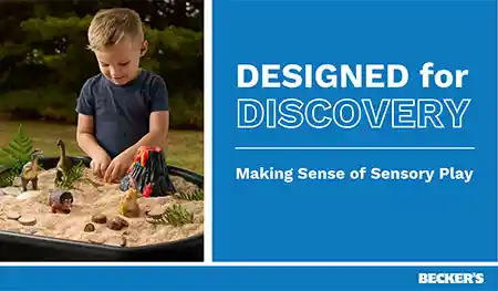Designed for Discovery presentation slide_boy playing with tuff tray