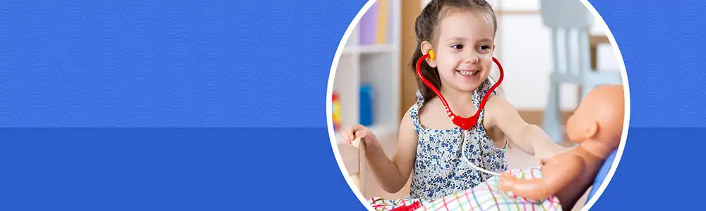 Preschool child playing with doll