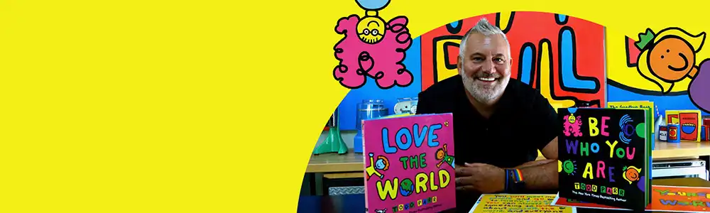 Preschool child & teacher playing at table